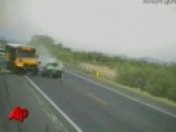 Raw Video: Car Hits School Bus Head-On