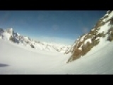 raw helmet cam footage: Skier falls off huge rocky cliff and SURVIVES